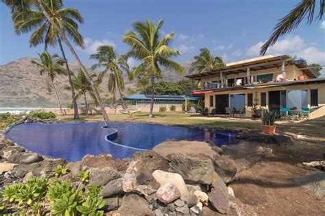 A Gorgeous Pool Overlooks The Ocean At This Stunning Retreat In Hawaii