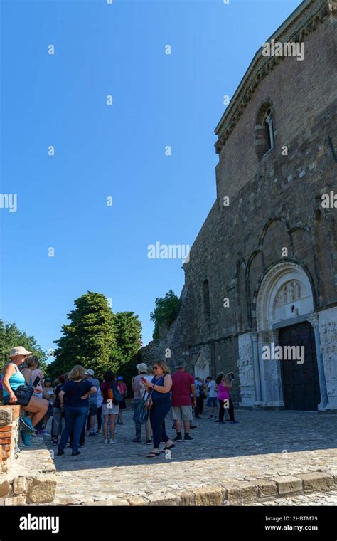 Tourists Visiting The Abbey Of San Giovanni In Venere Fossacesia