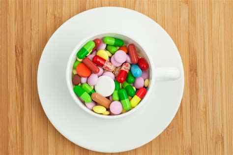 Premium Photo Cup With Multicolored Tablets And Capsules