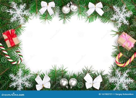 Christmas Frame Decorated With Bows And Snowflakes Isolated On White