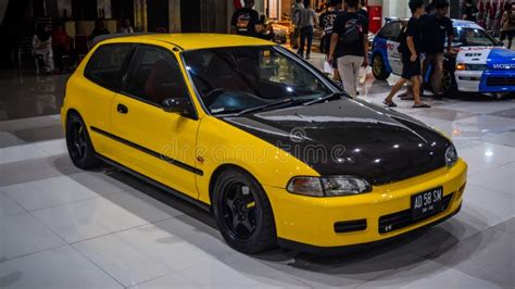 Modified Yellow Honda Civic EG6 Hatchback with Carbon Fiber Hood ...