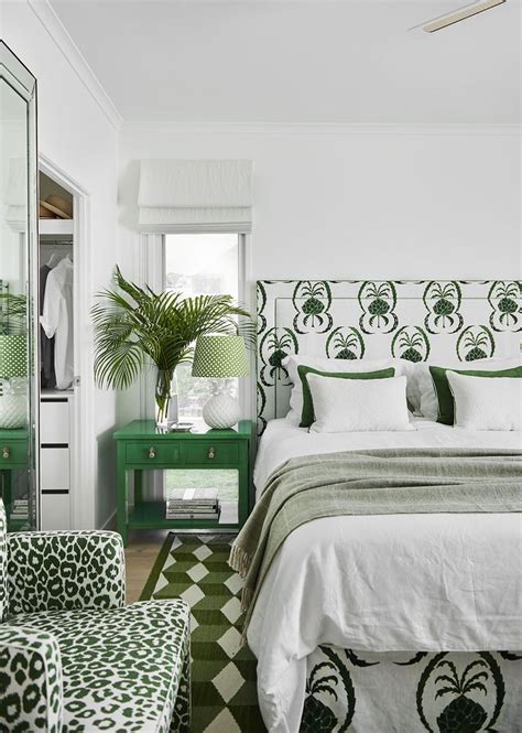 An Instagram Photo Of A Bedroom With Green And White Decor On The Walls