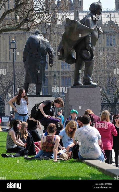 London, England, UK. People relaxing in Parliament Square - statues of ...