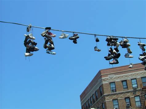 Shoes Tied On Power Lines A Symbol Of Urban Culture And Mystery Shoes