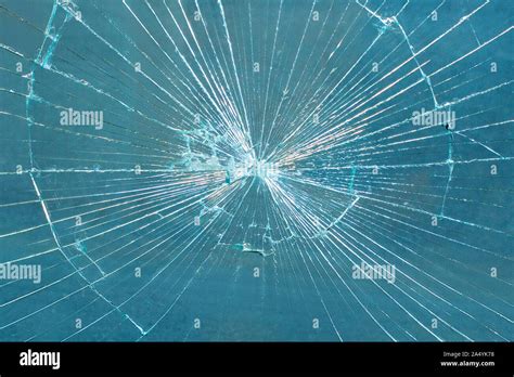 Broken Glass Pane. Smashed Blue Glass Stock Photo - Alamy