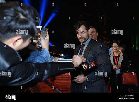 British Actor Henry Cavill Signs Autographs For Fans As He Arrives On