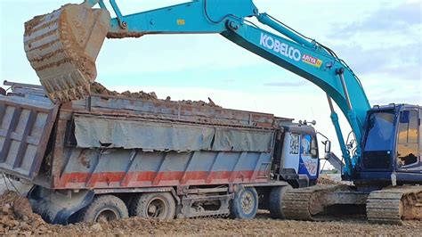 Action Work Of Heavy Machines Dump Truck Unloading Rock Soil Dump