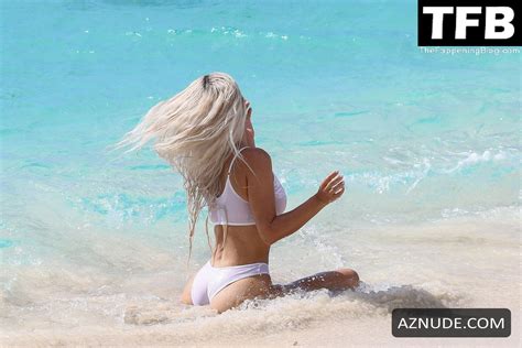 Kim Kardashian Sexy Seen Showing Off Her Hot Figure In A White Bikini At The Beach In Turks And