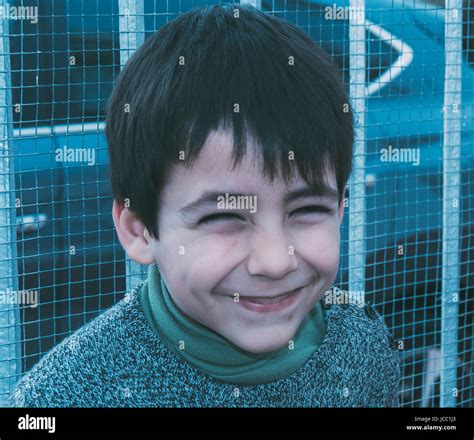 Boy With Green Eyes Smiling Stock Photo Alamy