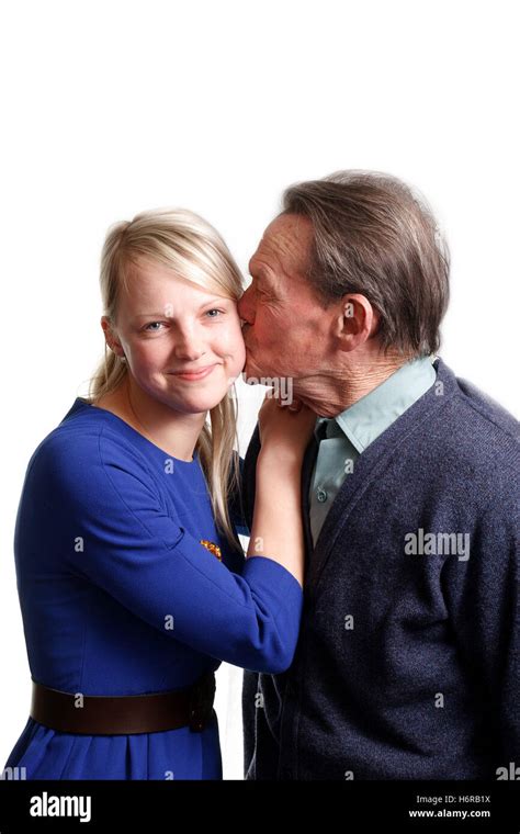 Young man kissing older woman hi-res stock photography and images - Alamy