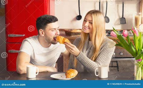 Adorable Loving Couple Sharing Breakfast Together In Kitchen Stock Image Image Of Male