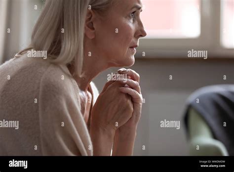 Mature Woman Alone Home Worried Hi Res Stock Photography And Images Alamy