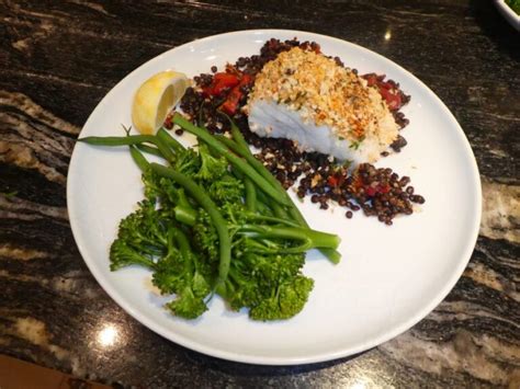 Recipe Harissa Crumbed Fish With Lentils Peppers Lesley Mitchell