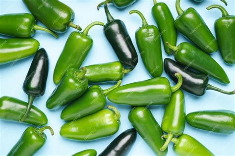 Premium Photo Green Jalapeno Peppers Beige Background Top View