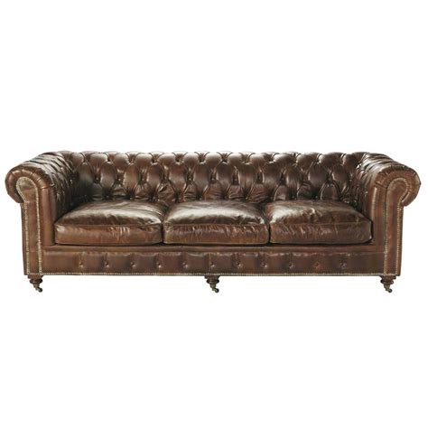 Canapé capitonné Chesterfield 4 places en cuir marron Vintage Maisons