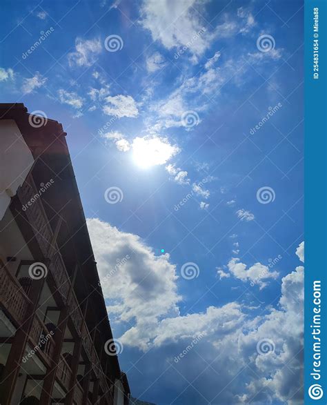 Sun behind the clouds stock photo. Image of cumulus - 254831654