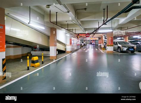 SHENZHEN, CHINA - APRIL 15, 2019: subterranean parking lot of a ...