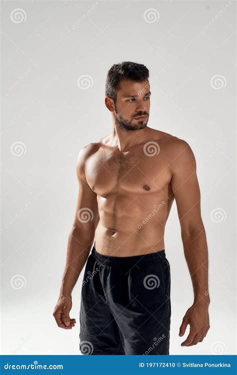 Vertical Naked Muscular Man Covering With A Banner Stock Photo Cartoondealer