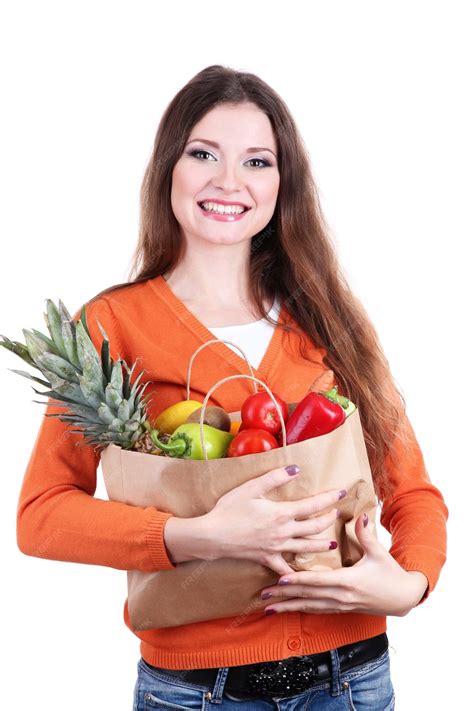 Premium Photo Woman Holding A Grocery Bag Full Of Fresh Vegetables