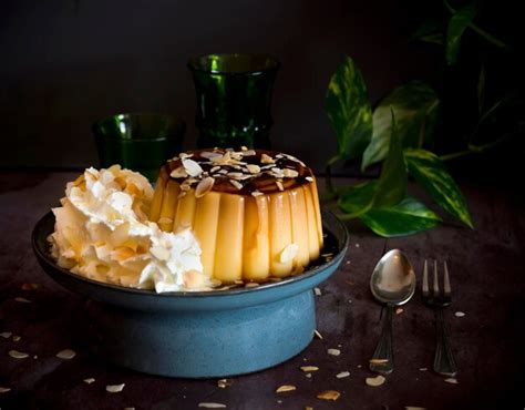 Premium Photo Vanilla Flan With Caramel Almonds And Cream