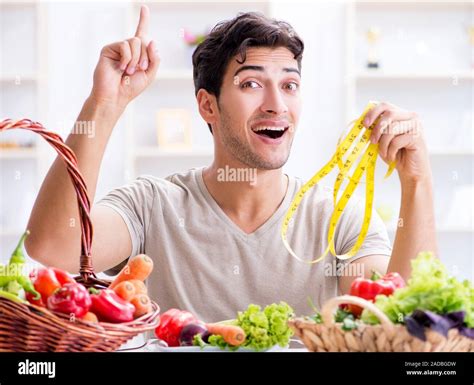 The Young Man In Healthy Eating And Dieting Concept Stock Photo Alamy