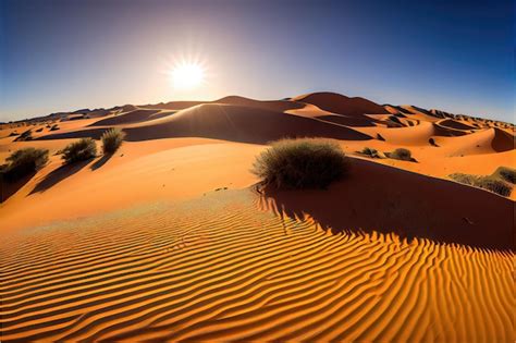 Uma paisagem desértica um pôr do sol ao fundo Foto Premium