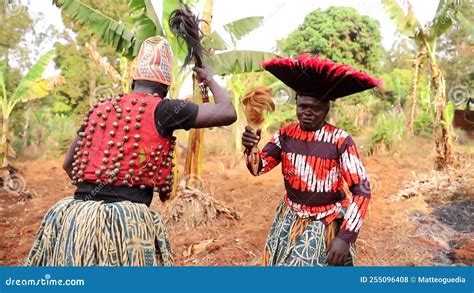 Two African Dancers Dance Dressed in Traditional Clothing during a Tribal Event Stock Footage ...