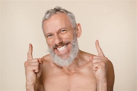 Premium Photo Handsome Caucasian Mature Middleaged Man With Grey Hair And Beard Shirtless