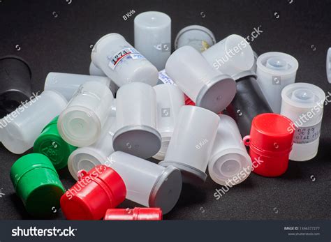 Plastic Film Canisters On Dark Background Stock Photo 1346377277