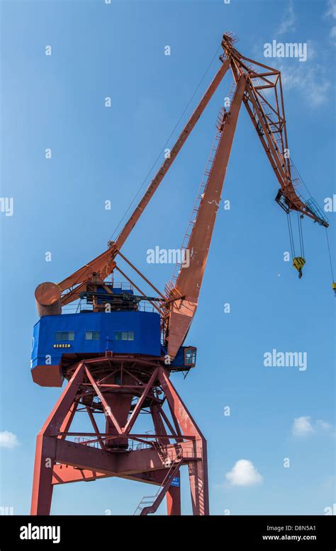 Industrial cranes at a shipyard and floating dry dock in Gothenburg ...