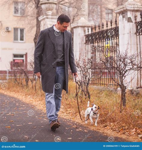 Man Walks With His Dog Stock Image Image Of Male Casual 200066199