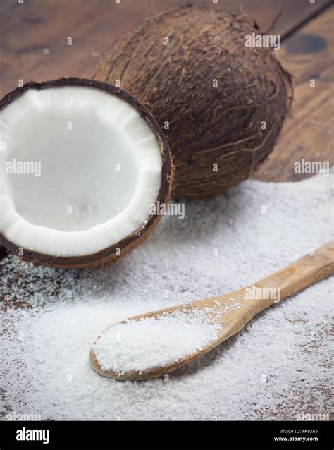 Close Up Of A Coconut And Grounded Coconut Flakes Stock Photo Alamy