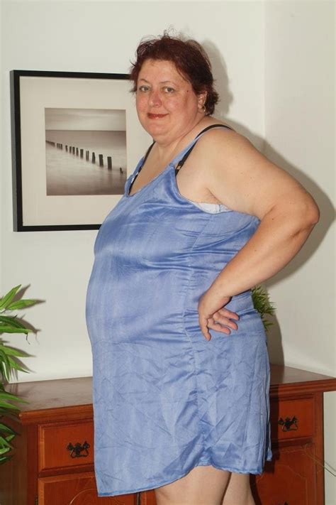 Pretty Mature Bbw Agnes Eva Strips Down To Show Her Big Boobs And Huge Rolls During A Live Sex Show