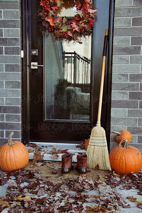 Front Door With Pumpkins By Stocksy Contributor Sandra Cunningham