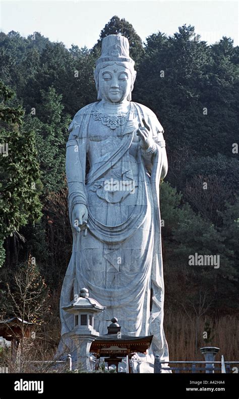 20m Tall Kannon Bodhisattva Statue Towers Above Surrounding Temple