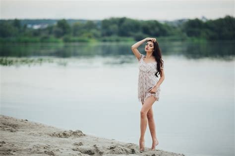Premium Photo Brunette Woman Wearing A Floral Dress