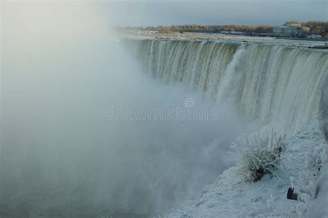 A View of the Falls Over Niagara Falls in the Winter Stock Photo ...