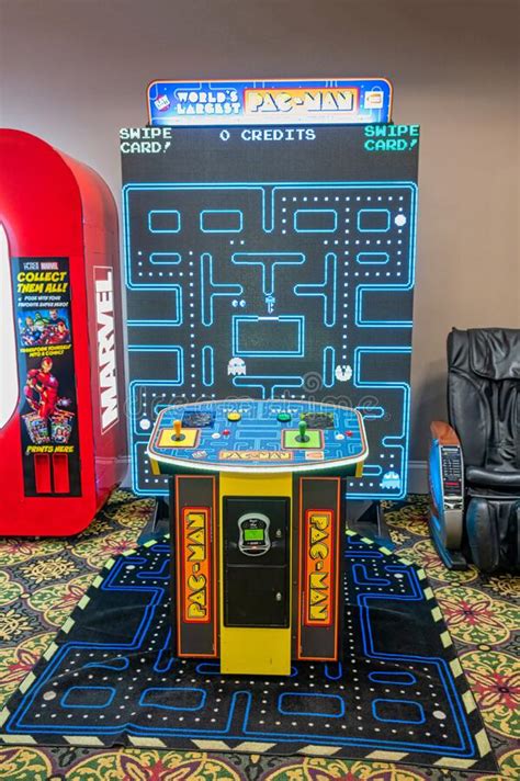 Various Games Machines in a Gaming Arcade Editorial Photo - Image of ...