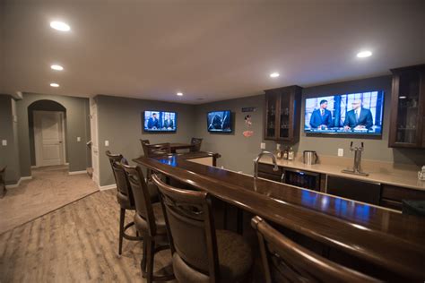 Royal Oak Mi Sports Themed Basement With Bar Basements Plus