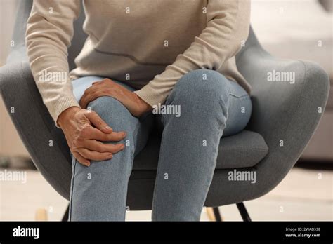 Mature Woman Suffering From Knee Pain Indoors Closeup Rheumatism