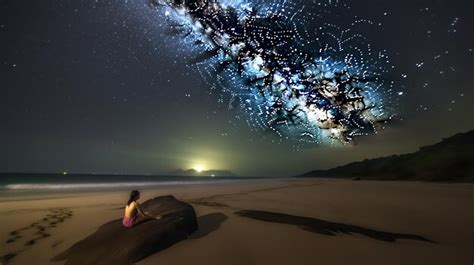 Premium AI Image | wallpaper beach and sky iluminated