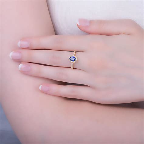 Eternity Sapphire And Diamond Oval Halo 18ct Yellow Gold Engagement