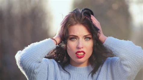 Close Up Attractive Brunette Girl With Beautiful Hair And Red Lips