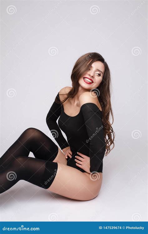 Fashionable Brunette In Socks And Sneakers And Body In White Studio Stock Photo Image Of Sock