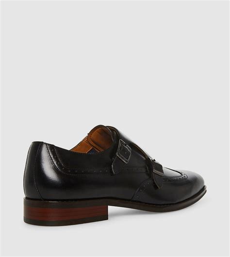 Buy Steve Madden ISAAC Buckle Closure Monkstrap Shoes In Black | 6thStreet UAE