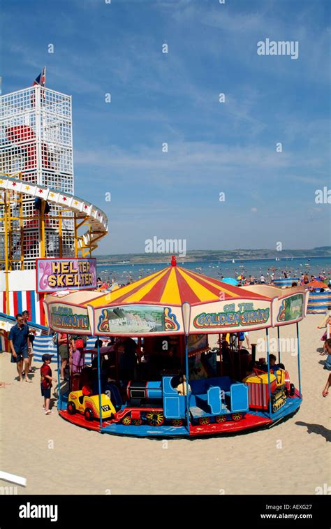 Beach fairground on Weymouth Beach, Dorset Stock Photo - Alamy