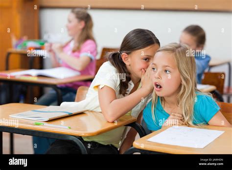 Students Whispering Classroom Hi Res Stock Photography And Images Alamy