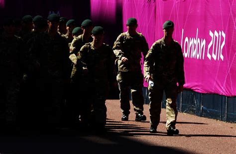 Britain Adds Troops For Olympics And Tries To Avert Strike At Airport