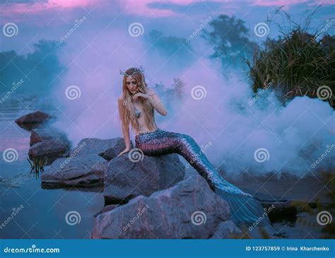 Man Sitting On The Rock At Canyon Of Black Lagoon Laguna Negra And