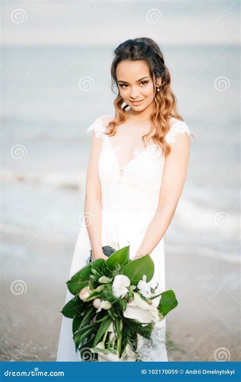 Bride With A Wedding Bouquet On The Shore Sea Stock Image Image Of